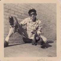 bow with baseball mitt